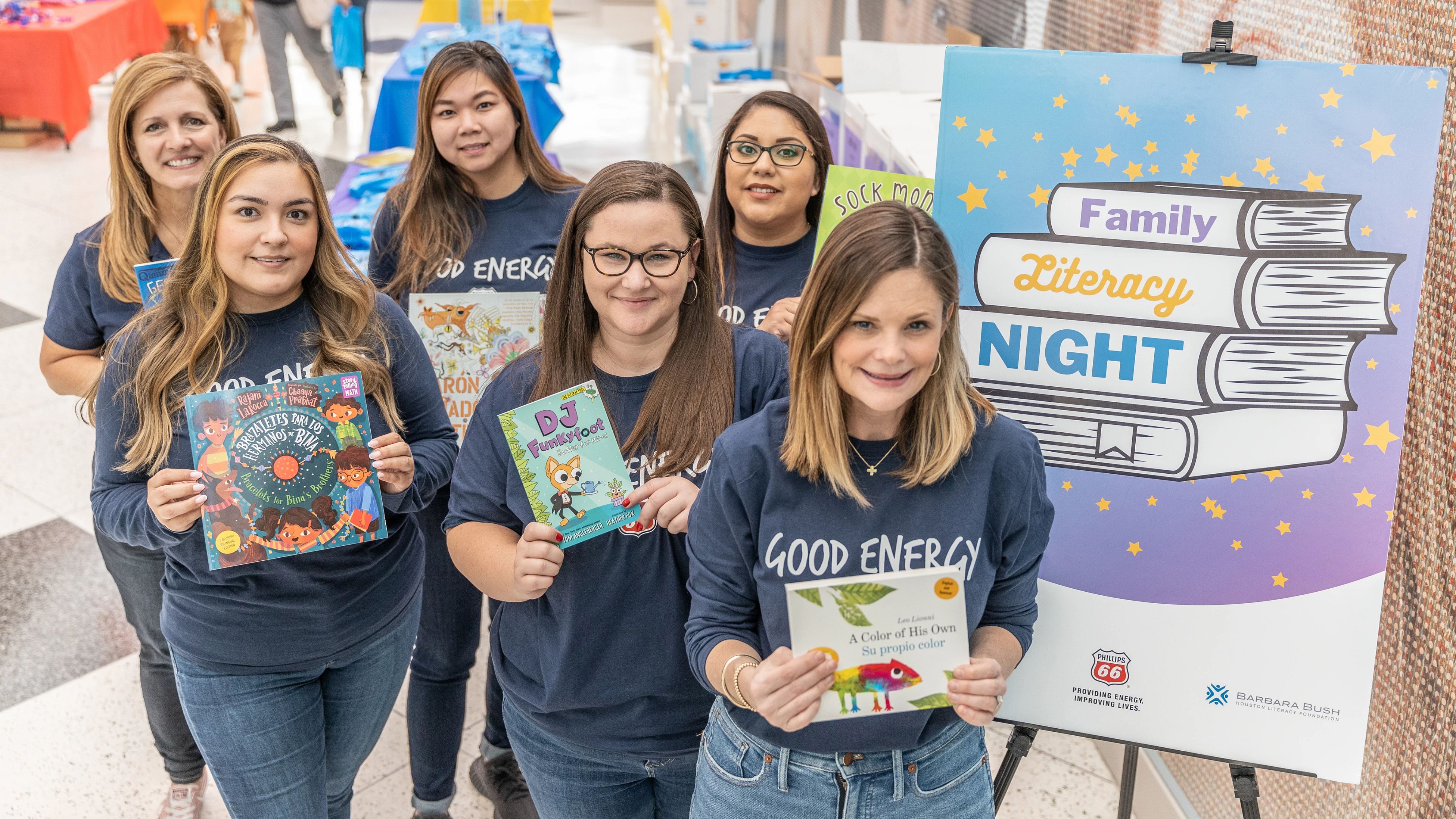 Volunteer at the Barbara Bush Literacy night at the Children's Museum of Houston, where Phillips 66 donated mini-libraries to all children at the free family night.